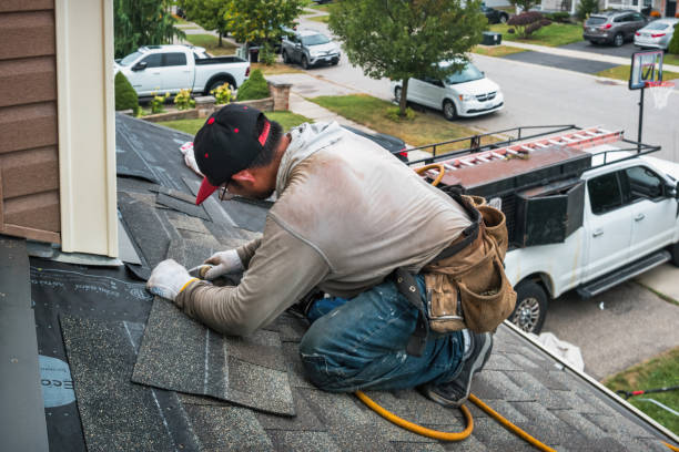Professional Roofing technician working in Shirley, MA